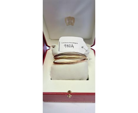 Cartier Trinity three colour 18ct gold bangle, complete with original box.Gross weight 59.5g 