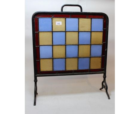 Brass firescreen inset with coloured, leaded glassGood condition, slight scratches to a couple of glass panels. All needs ext