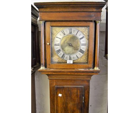 18th Century oak longcase clock, the square hood with flanking pilasters above a rectangular panelled door and conforming pli