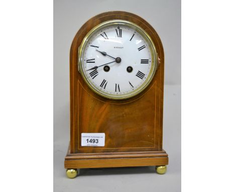 Edwardian mahogany with boxwood line inlaid mantel clock, the circular enamel dial with Roman numerals, signed Brocut, with a