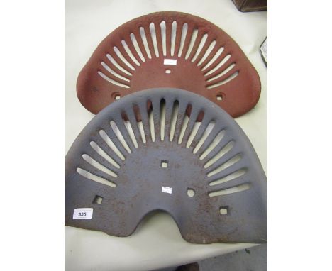Pair of original early 20th Century cast iron tractor seats, in original condition 