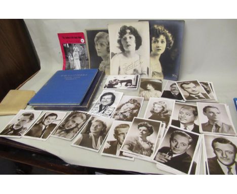 Envelope containing a quantity of early 20th Century postcards of actors and actresses, some larger photographs, theatre prog