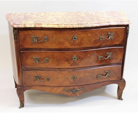 Early 20th Century French kingwood and marquetry inlaid serpentine shaped commode, the figure moulded marble top above three 