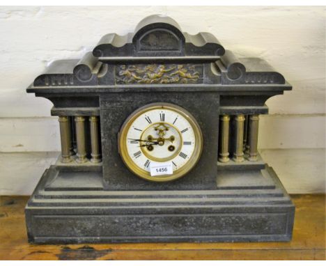 Large 19th Century black slate and brass mounted mantel clock, the enamel dial with Roman numerals and visible escapement, 40