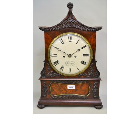 19th Century flame mahogany pagoda topped bracket clock having circular painted dial, with Roman numerals inscribed J.N. Hend