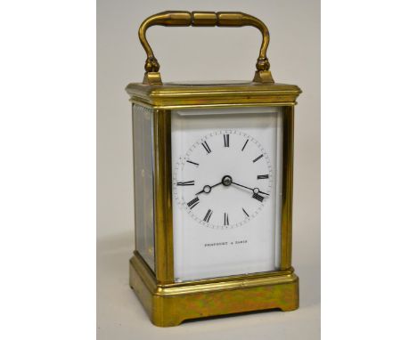 Small late 19th / early 20th Century brass cased carriage clock by Drocourt, Paris, the enamel dial with Roman numerals, the 