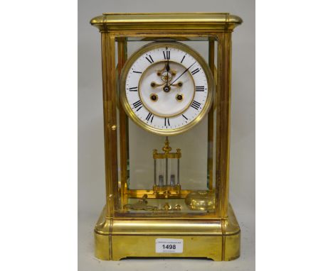Large late 19th / early 20th Century French gilt brass four glass library clock, the enamel dial with Roman numerals, the two