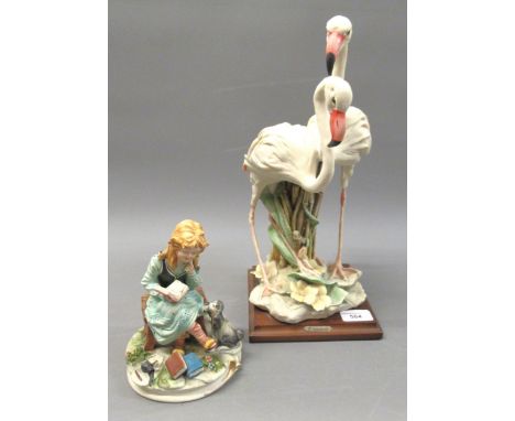 Capo di Monte group of two flamingo, together with a Capo di Monte figure of a girl reading from a book 