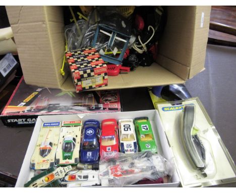 Seven various Scalextric model cars together with a large quantity of various Scalextric accessories 