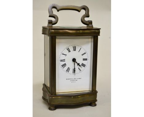 Small brass cased carriage clock, the enamel dial with Roman numerals, signed Campbell & Lumby, Liverpool, 12cms high 