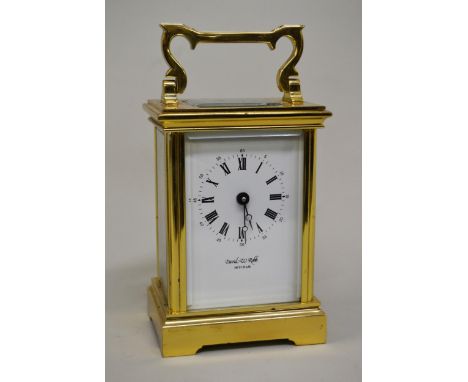 French gilt brass carriage clock, the enamel dial inscribed David W. Robb, Mitcham 