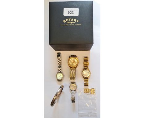 Mudu wristwatch, three ladies wristwatches and a silver bangle 