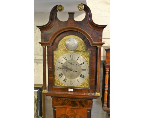 19th Century mahogany longcase clock, the broken arch hood above a shaped and crossbanded panel door, flanked by reeded quart