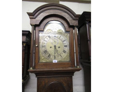 George III oak longcase clock, the broken arch hood with flanking pilasters above an arched door and conforming plinth, the b