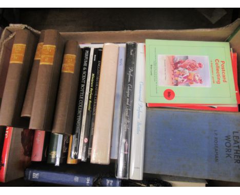 Box containing a collection of books including porcelain perfume bottles, Clarice Cliff etc. 