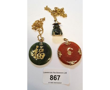 Two modern jade and yellow metal mounted disc pendants, together with a similar pendant in the form of a seated figure and tw