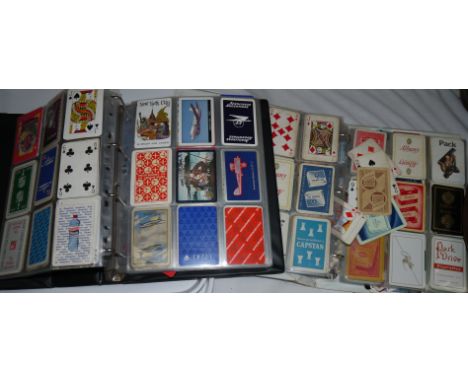 A collection of advertising playing cards, designs including cigarettes and tobacco