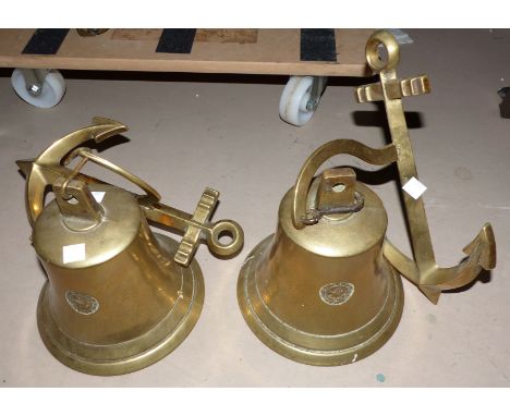 Two reproduction brass ships' bells, one with anchor bracket, one lettered 'PS Graf Spee 1939'