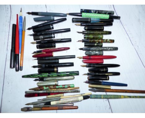 A quantity of vintage fountain pens