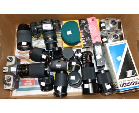 A Pentax SFx SLR camera; a Pentax 28-80 lens; other various lenses including Praktica 