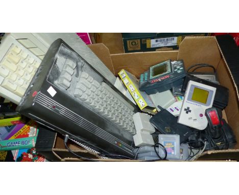 2 vintage games consoles, a Commodore 16 and Atari 520st, an original Gameboy and games (not guaranteed working) other games 
