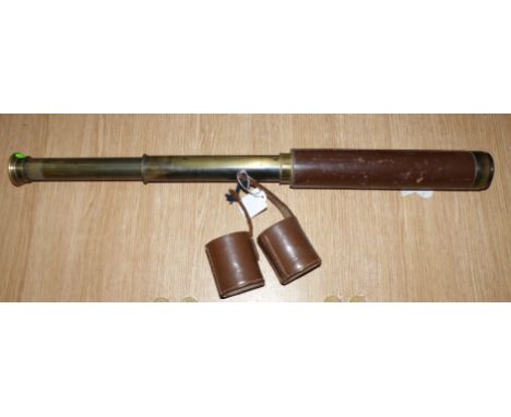 A brass telescope in leather case by Broadhurst, Clarkson & Co. Ltd 11'' (cased size)