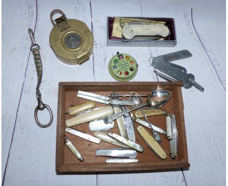 Various pocket knives, a military compass etc.