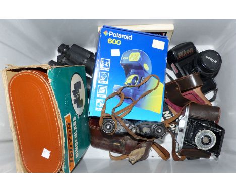 A Nikon F-401s camera and booklet, a boxed Polaroid 600, a Kershaw camera, a pair of Zeiss field glasses and 2 other pairs of