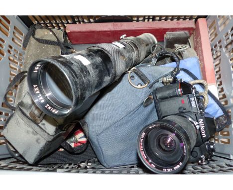 A Nikon F300 SLR camera with macro focus 300mm lens; Prince Galaxy telephoto lens and other photographic equipment