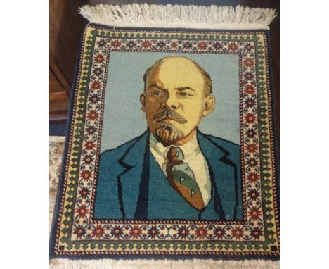 An Azerbaijan rug another rug, 138cm x 89cm, 142cm x 84cm, also a small portrait rug.