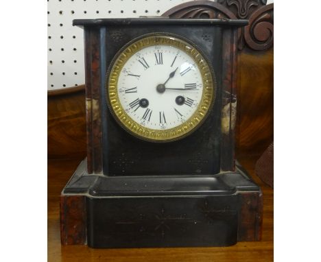 Victorian slate and marble mantle clock with bell strike and eight day movement height 23cm.