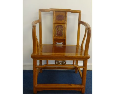 A Chinese light wood elbow chair with decorated back panels, height 85cm.