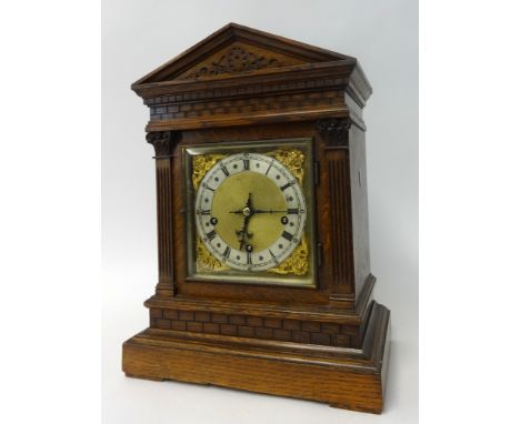 A 19th century German, chiming bracket clock, with architectural oak case, striking on a rack on gongs, height 45cm.