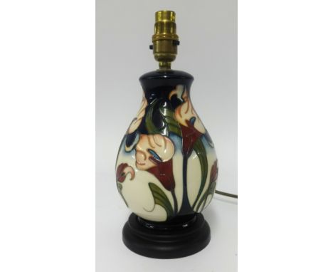 Moorcroft, a modern pottery table lamp decorated with lilies.