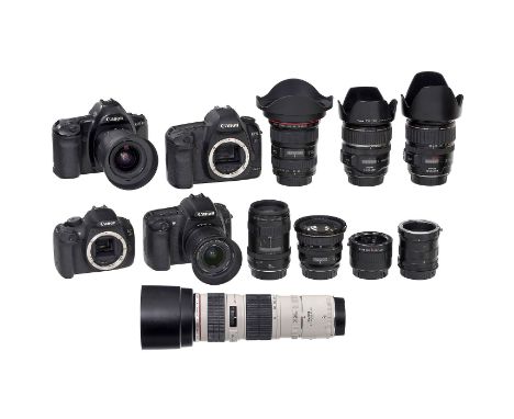 Canon EOS AusrüstungCanon, Japan. Alle Optiken unter Punktlicht sauber, mit allen Deckeln. Autofocus, Stabilisatoren und weit