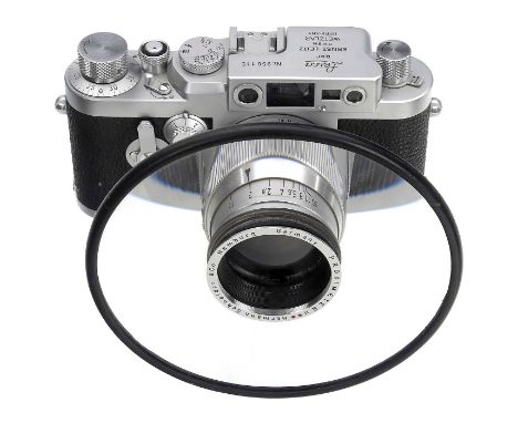 Leica IIIg, Summarit und Proximeter, um 1959Leitz, Wetzlar. Leica IIIg Nr. 956115, Filmtypen-Schildchen auf der Merkscheibe f