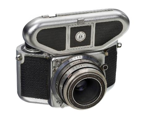 Mecaflex (Kilfitt-Konstruktion), 1953Metz Apparatefabrik, Fürth. SLR 24 x 24 mm, Nr. 1059, Prontor-Reflex 1-1/300 Sek., läuft