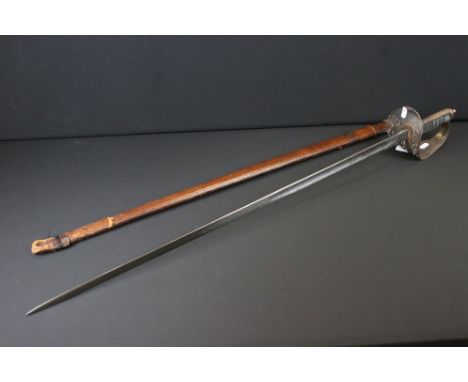 A British Military King George VI Cavalry Officers Sword Complete With Leather Scabbard. 