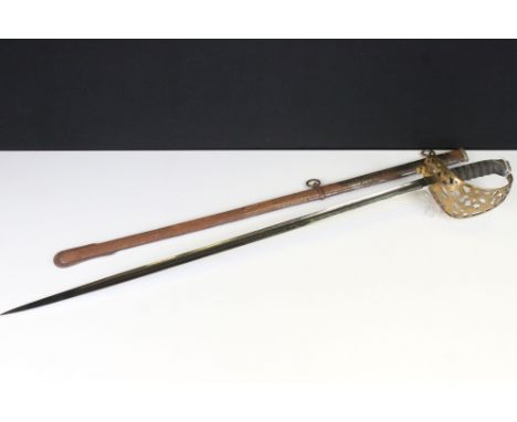 A British Military Officers Dress Sword, Brass Basket With Shagreen Grip, Flaming Grenade Under Crown To The Blade, Complete 