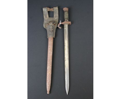 A World War One Era French Bayonet Complete With Scabbard And Leather Frog. 