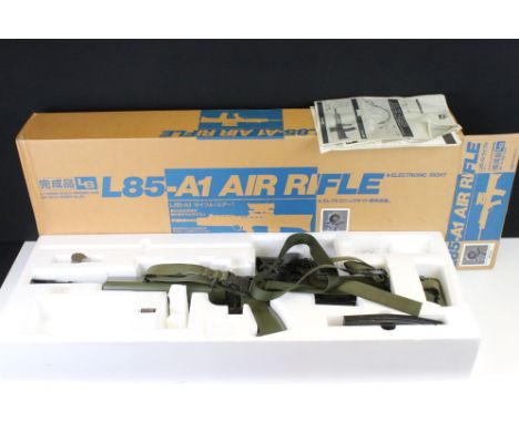 An Air Soft L85-A1 BB Air Rifle, Complete With Box And Instructions. No licence required to buy this item, purchaser must be 