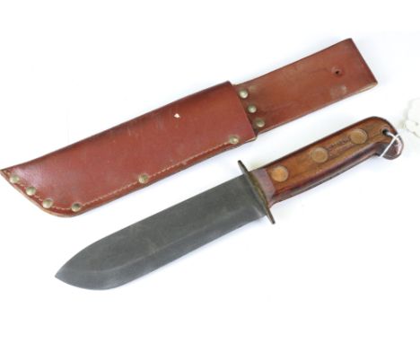 A British Military Issued Jungle / Survival Knife With Leather Scabbard, Knife Numbered 127-8214 And Dated 1988 With The Brit