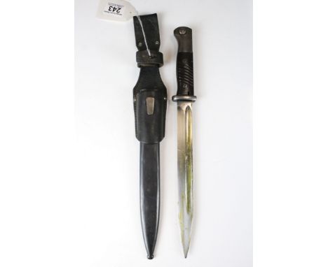 A World War Two German K98 Mauser Bayonet Complete With Scabbard And Leather Frog. 