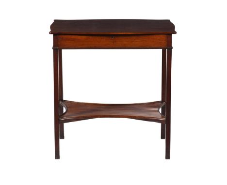 An unusual George III mahogany enclosed bijouterie table, circa 1810, the hinged top opening to a further glass panelled and 