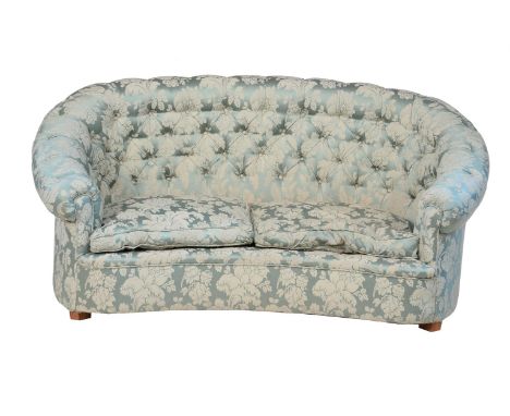 A damask button upholstered sofa, in Victorian style, 20th century and later, of kidney outline, 84cm high, 171cm wide, appro