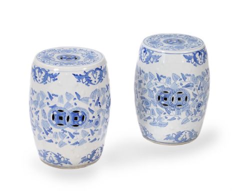 A pair of Chinese ceramic garden seats, modern, of typical barrel form, decorated in blue and white, 47cm highProvenance: The