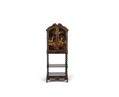 A Chinese Export black lacquer and gilt chinoiserie decorated cabinet on stand, first half 19th century, decorated throughout