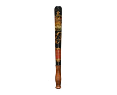 A Victorian painted and carved wood truncheon by Parker of Holborn, of Welsh Interest, the turned and tapered handle painted 