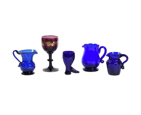 A selection of English coloured glass, various dates 18th and 19th centuries, comprising: an amethyst and gilt goblet with a 