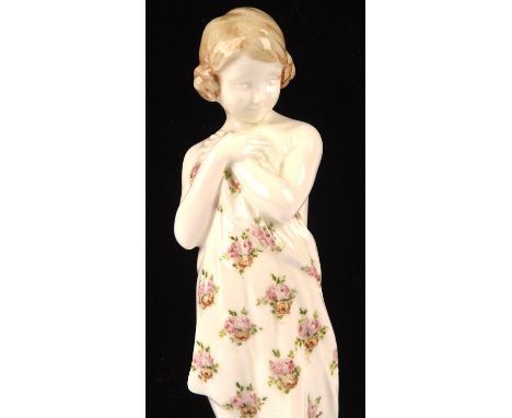 Johann Petrides for Goldscheider,  figure of a girl holding a floral shawl, signed to base, impressed numbers 4614 to base, 2